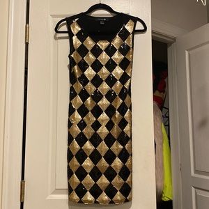 Forever 21 black and gold sequined dress.